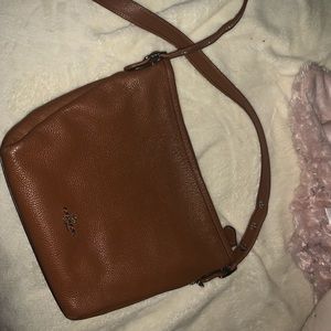 Tan crossbody coach purse.!! Used a few times.